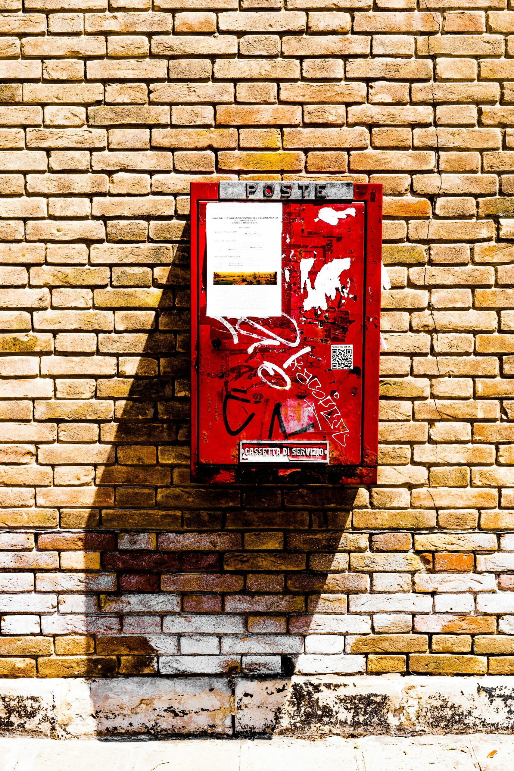 rectangular wall-mounted red metal case